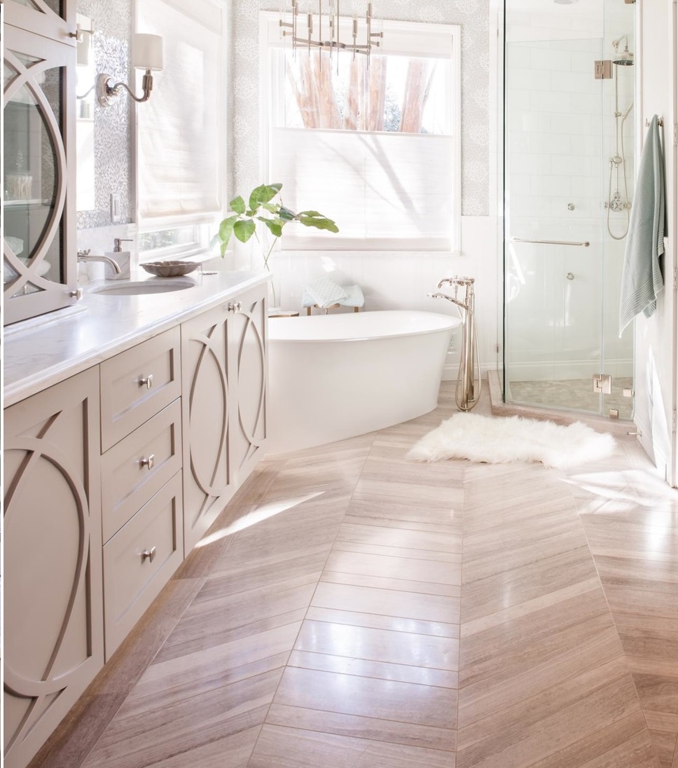 photos-hgtv-chevron-hardwood-floor-white-bathtub-and-glass-door-shower-in-bright-contemporary-bathroom_chevron-wooden-floor_home-decor_home-decor-blog-decorators-rugs-decorating-catalog